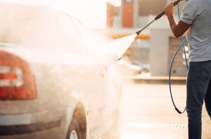 Washing Car with Hose